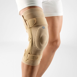 Bauerfeind elastische Kniebandage | Seitliche Stabilisierung | Schienen und Polster | Beige | Mehrere Größen | GenuTrain S Pro
